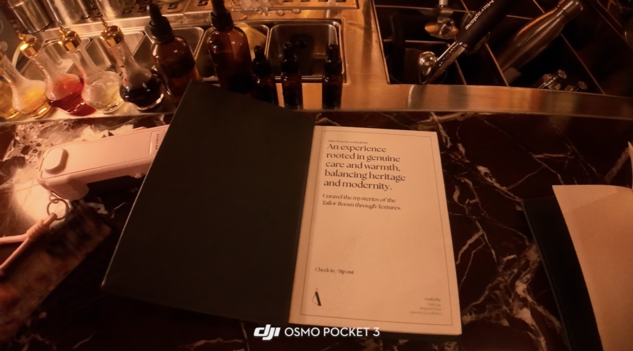 Tailor Room menu booklet on the marble bar